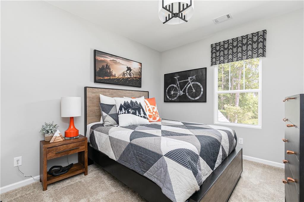 337 Brighton Bnd Lane Acworth, GA 30102 - Photo 34 of 83 a bedroom with a bed and a window