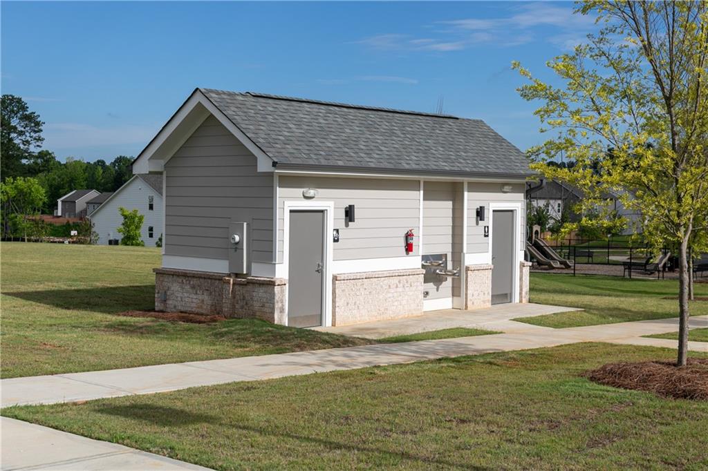337 Brighton Bnd Lane Acworth, GA 30102 - Photo 51 of 83 a front view of a house with a yard
