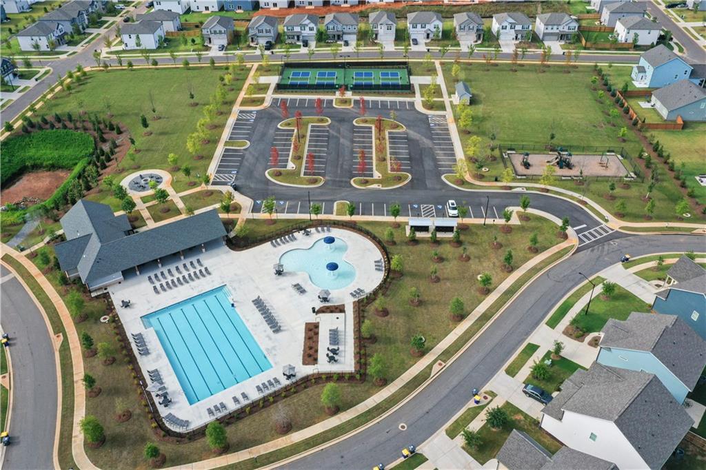 337 Brighton Bnd Lane Acworth, GA 30102 - Photo 60 of 83 an aerial view of a swimming pool with outdoor seating lake and mountain view