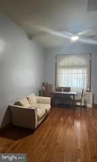 a bedroom with two beds and a couch