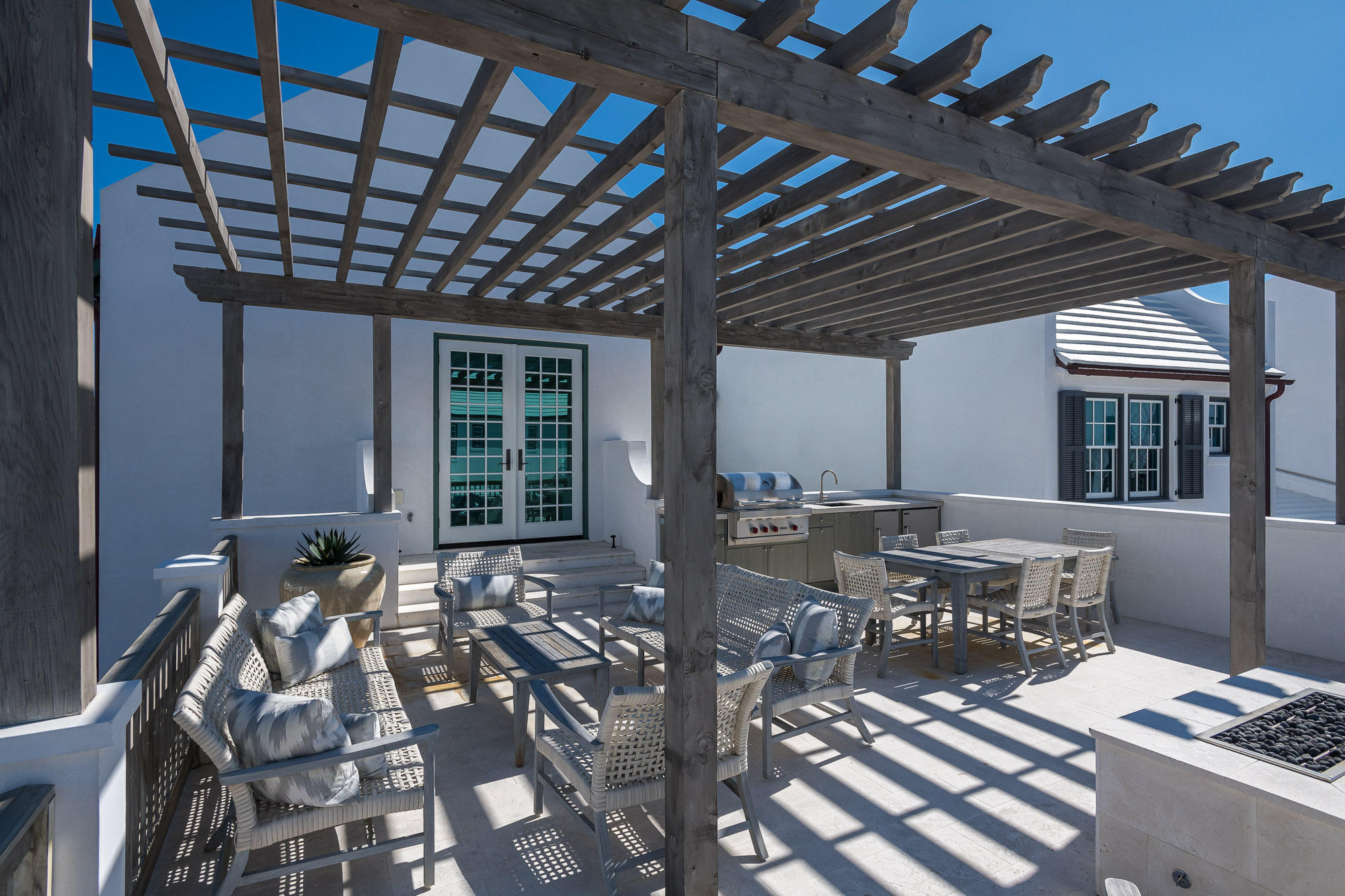 109 Charles Street Inlet Beach, FL 32461 - Photo 42 of 42 a view of a dinning table and chairs in the patio