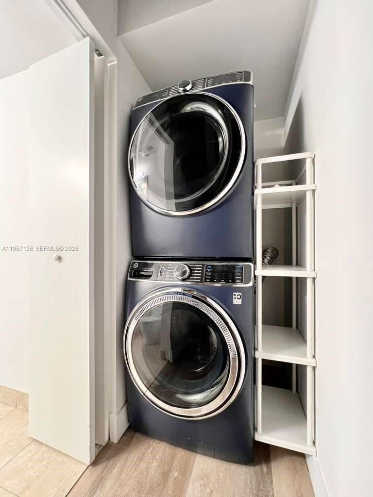90 Southwest 3rd Street, Unit TH300A Miami, FL 33130 - Photo 11 of 21 a utility room with dryer and washer