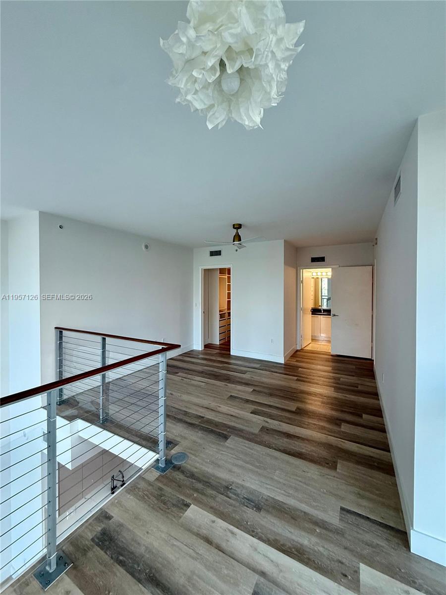 90 Southwest 3rd Street, Unit TH300A Miami, FL 33130 - Photo 14 of 34 Master Bedroom facing double height space
