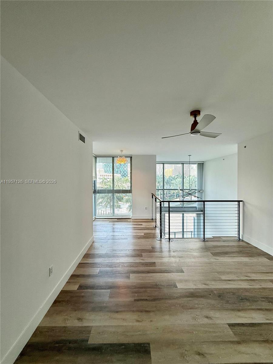 90 Southwest 3rd Street, Unit TH300A Miami, FL 33130 - Photo 15 of 34 Master bedroom facing double height space