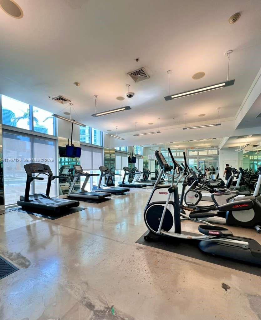 90 Southwest 3rd Street, Unit TH300A Miami, FL 33130 - Photo 20 of 21 a view of a room with gym equipment