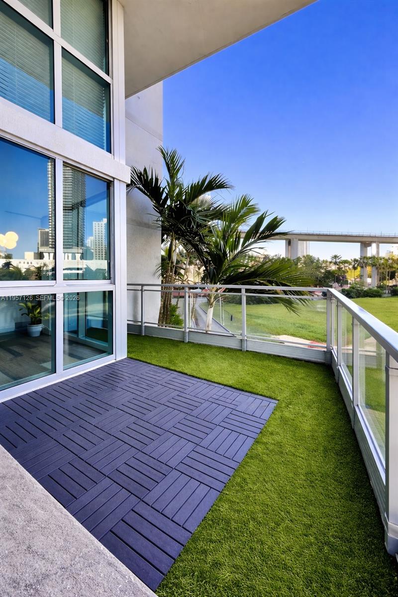 90 Southwest 3rd Street, Unit TH300A Miami, FL 33130 - Photo 9 of 21 a view of swimming pool with a yard