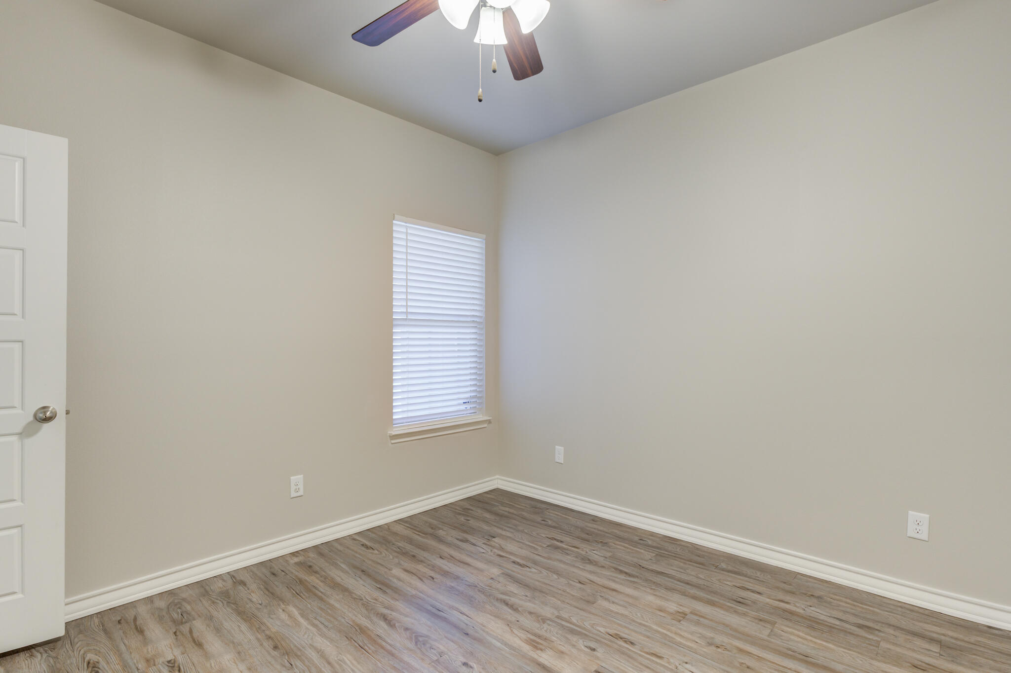 3404 25th Street Lubbock, TX 79410 - Photo 20 of 38 an empty room with a window