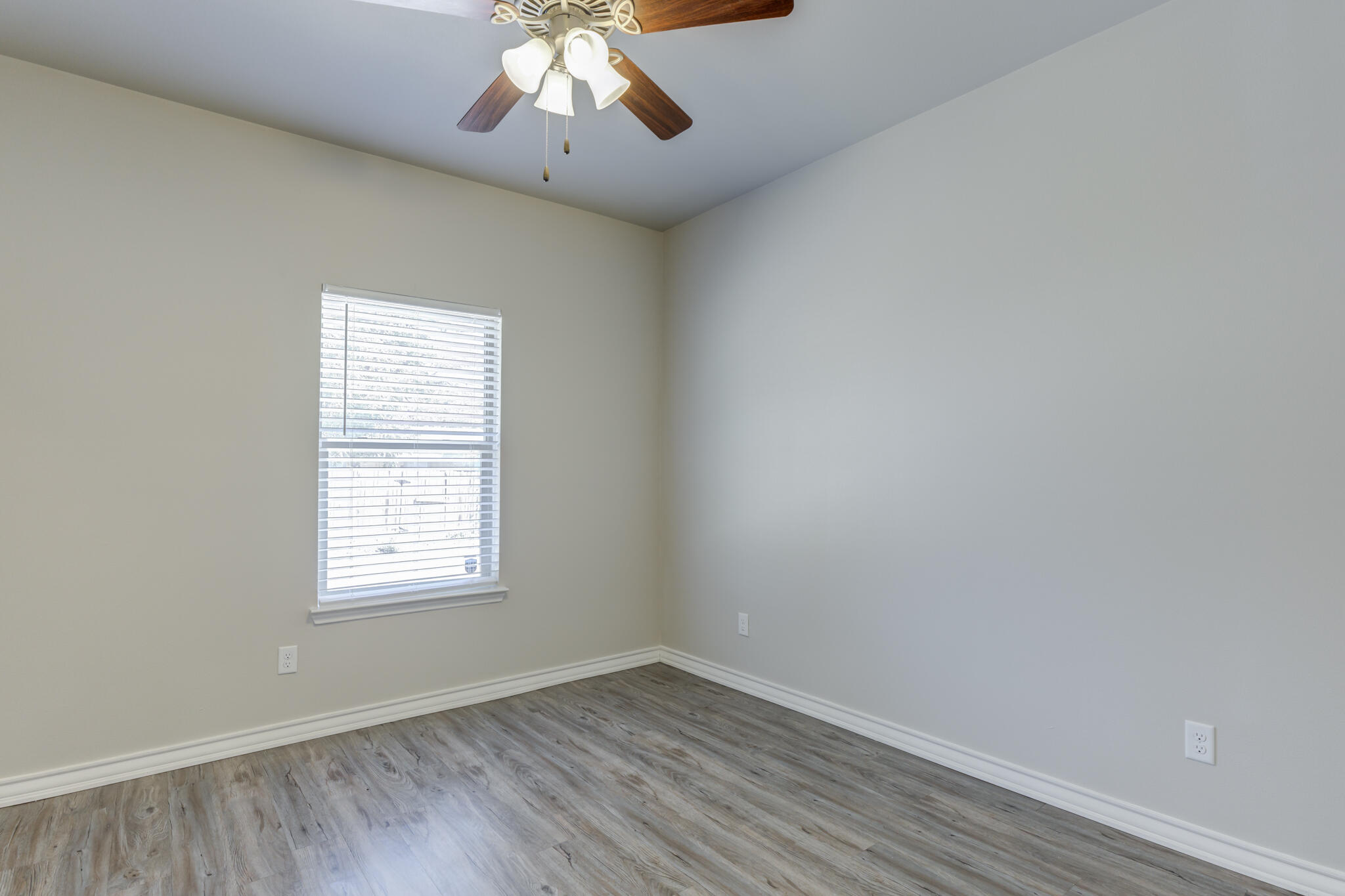 3404 25th Street Lubbock, TX 79410 - Photo 24 of 38 an empty room with a window