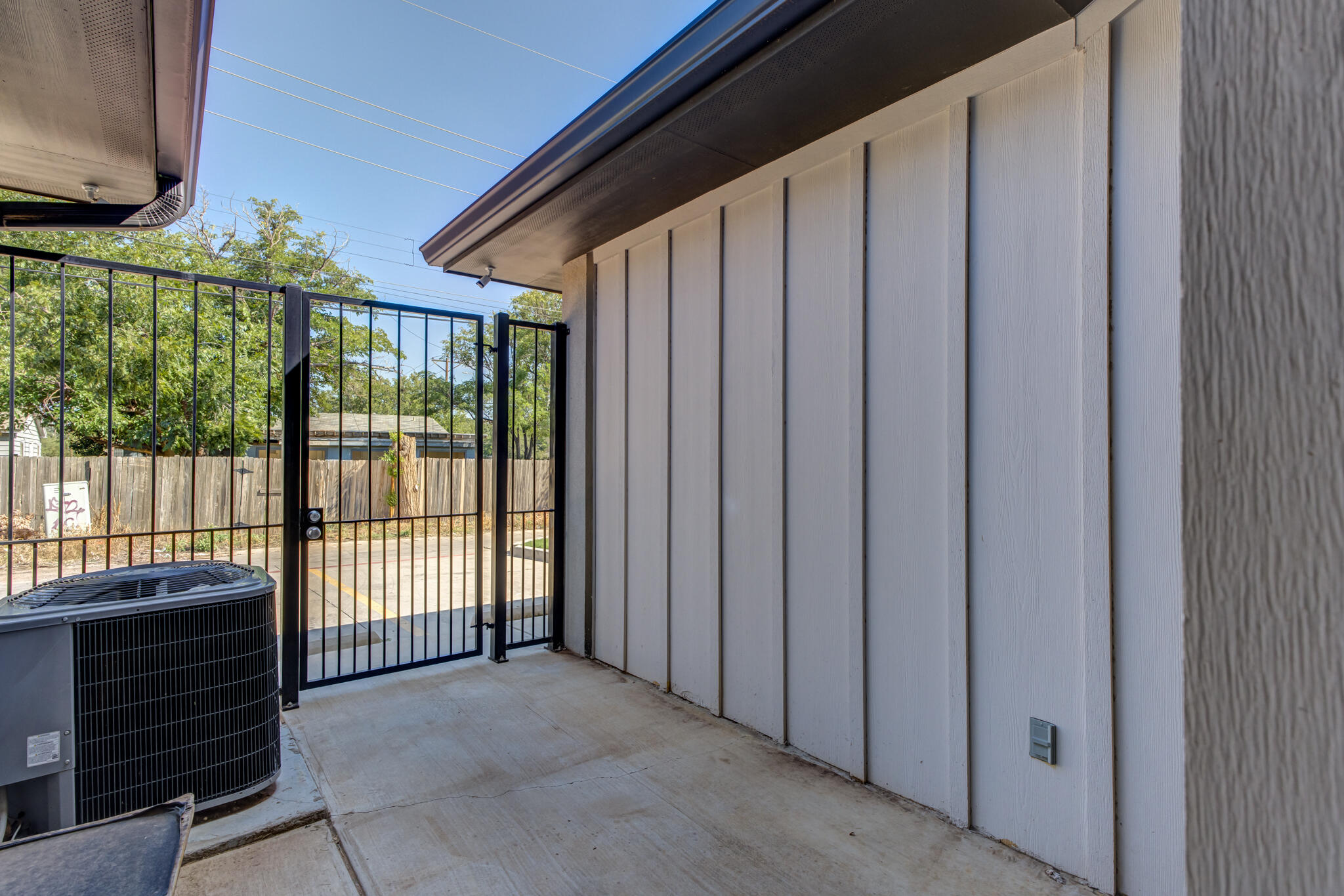 3404 25th Street Lubbock, TX 79410 - Photo 35 of 38 a view of a porch with wooden floor