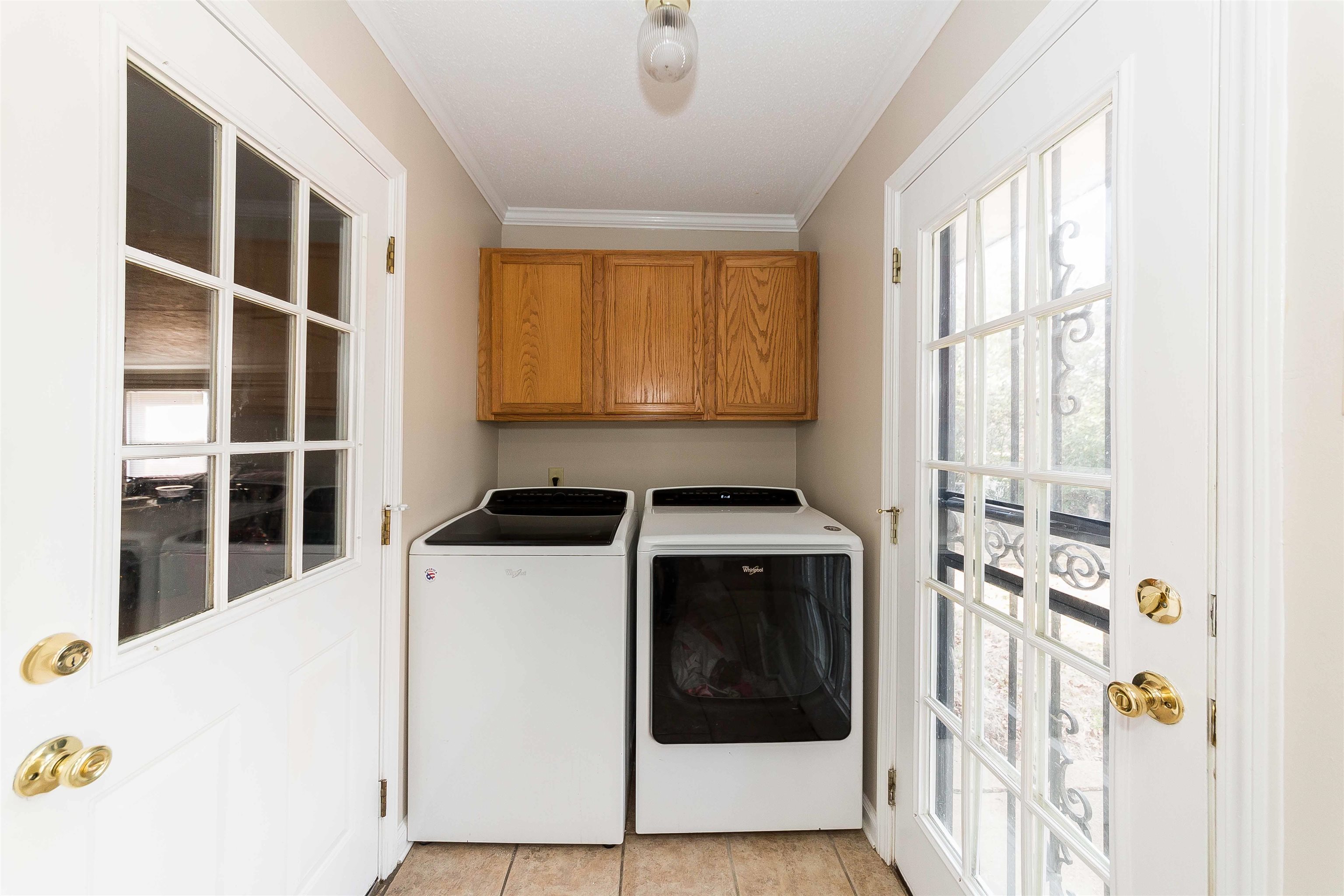 3105 Charles Bryan Road Bartlett, TN 38134 - Photo 11 of 29 a utility room with dryer and washer