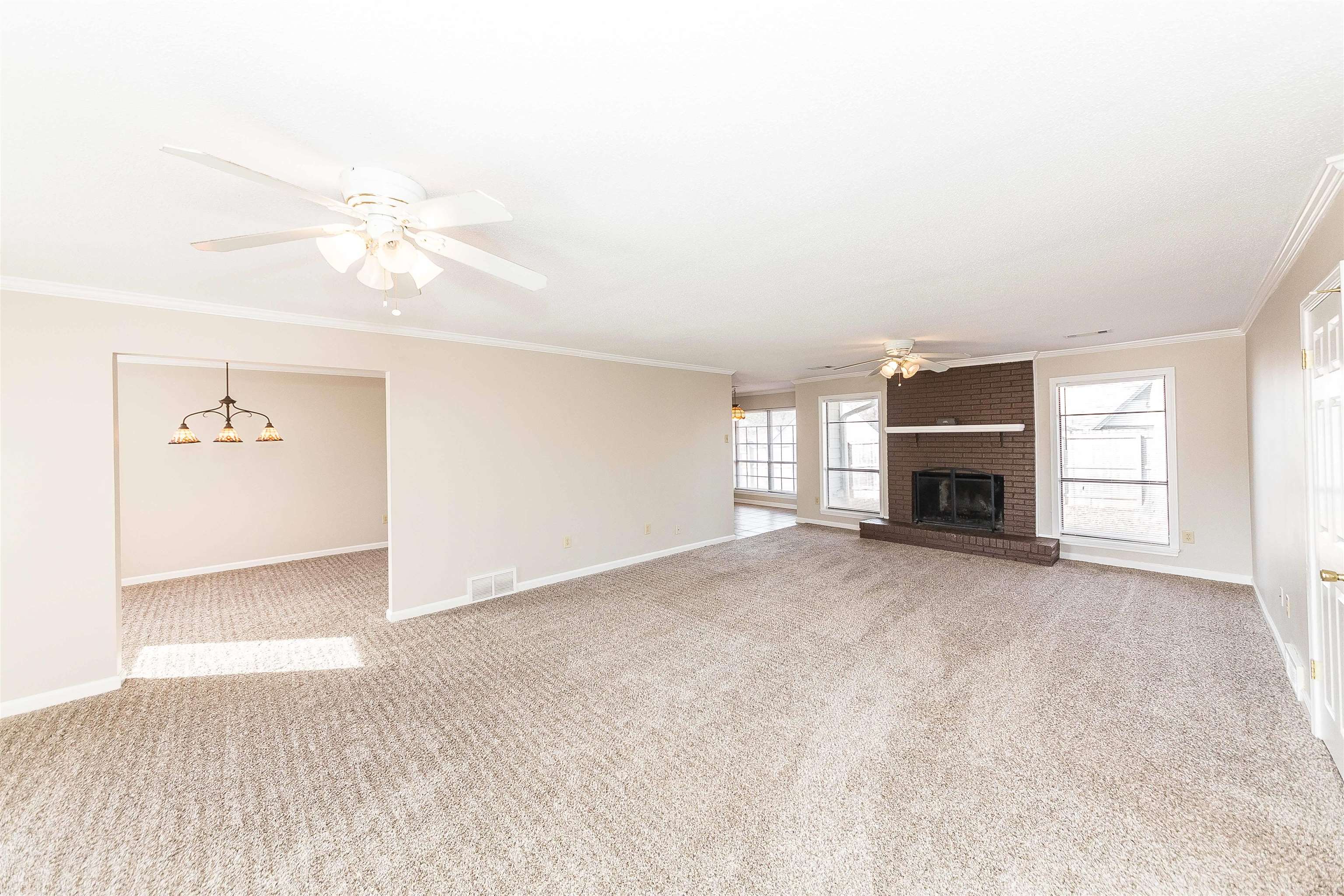 3105 Charles Bryan Road Bartlett, TN 38134 - Photo 29 of 29 an empty room with a fireplace and a window
