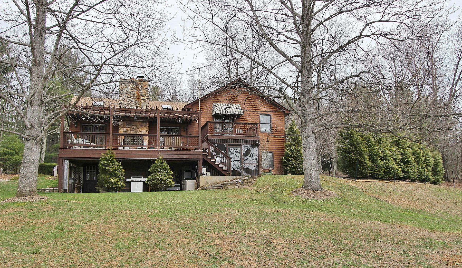 1282 Sunny Ridge Road Northeast Floyd, VA 24091 - Photo 1 of 53 a front view of a house with a yard