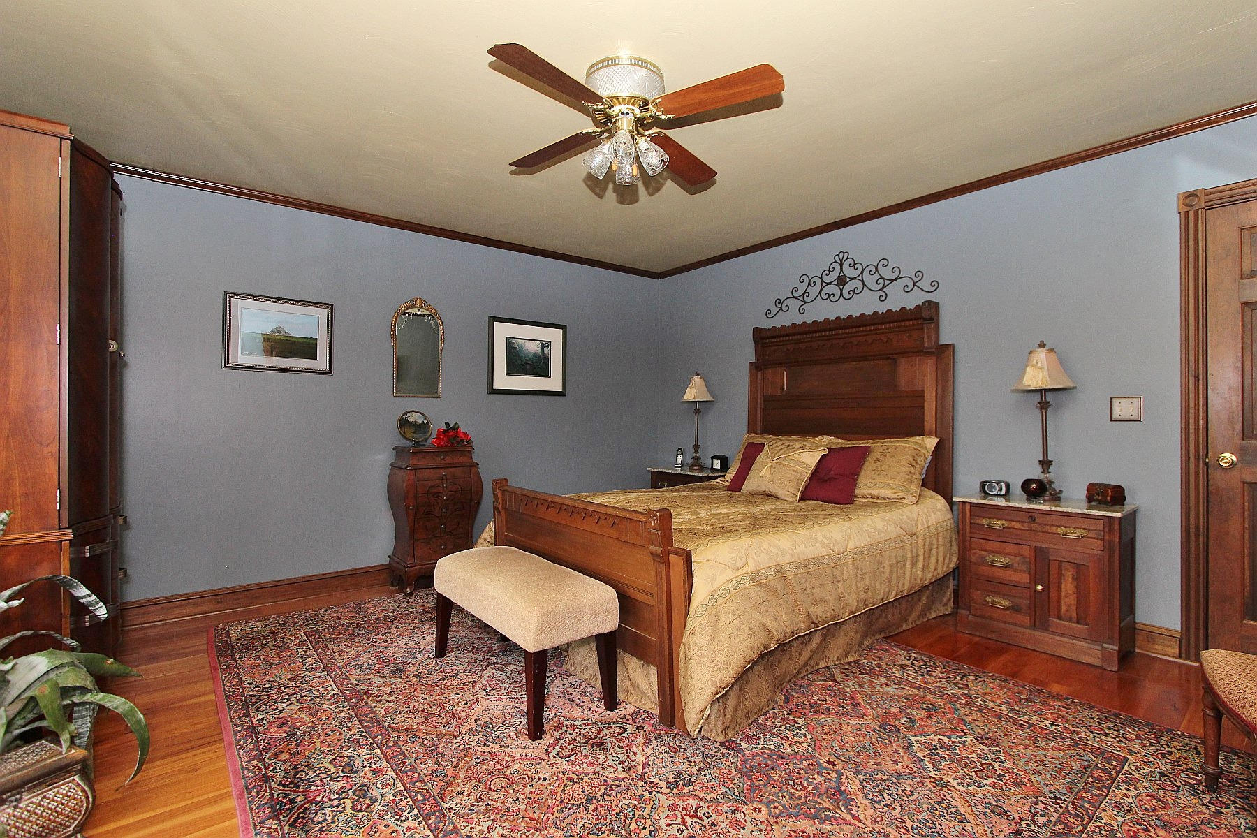 1282 Sunny Ridge Road Northeast Floyd, VA 24091 - Photo 20 of 53 a bedroom with a bed and a chandelier