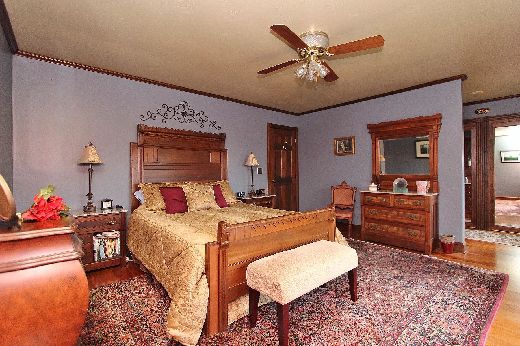 1282 Sunny Ridge Road Northeast Floyd, VA 24091 - Photo 21 of 53 a bedroom with a bed and a chandelier