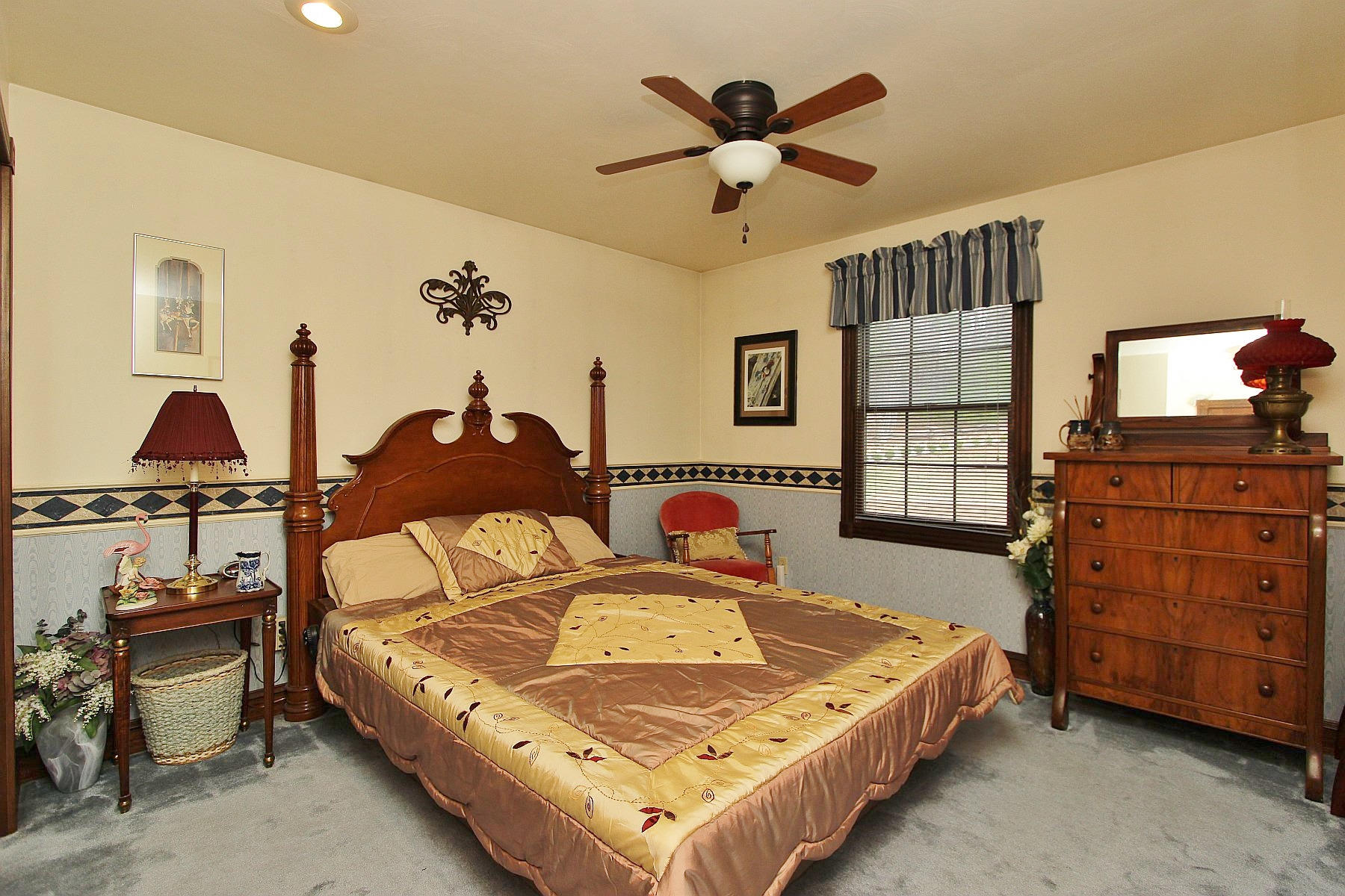 1282 Sunny Ridge Road Northeast Floyd, VA 24091 - Photo 25 of 53 a bedroom with a bed and dresser with mirror