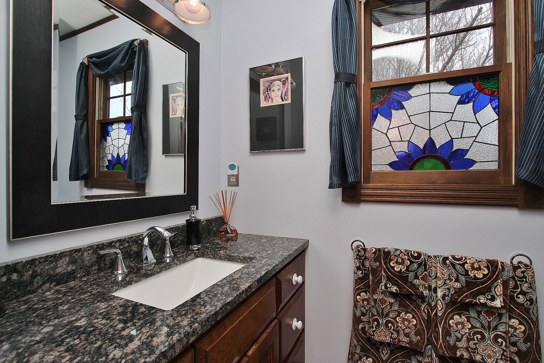 1282 Sunny Ridge Road Northeast Floyd, VA 24091 - Photo 27 of 53 a bathroom with a granite countertop double vanity sink and a mirror