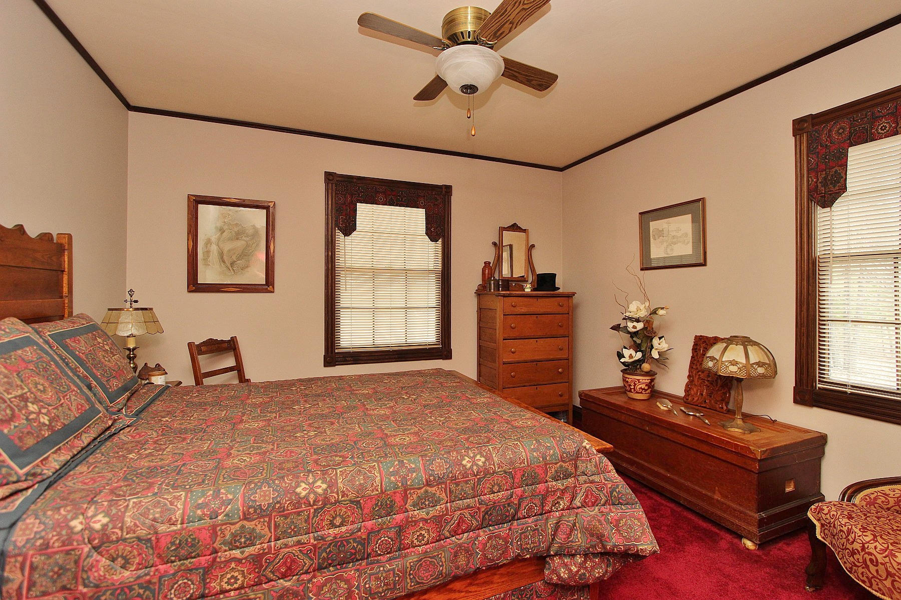 1282 Sunny Ridge Road Northeast Floyd, VA 24091 - Photo 28 of 53 a bedroom with a bed and dresser with mirror