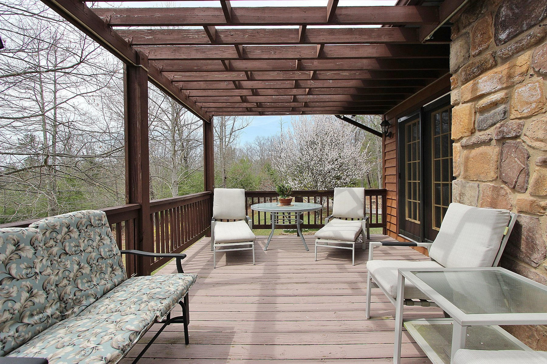 1282 Sunny Ridge Road Northeast Floyd, VA 24091 - Photo 31 of 53 a roof deck with couch and chairs