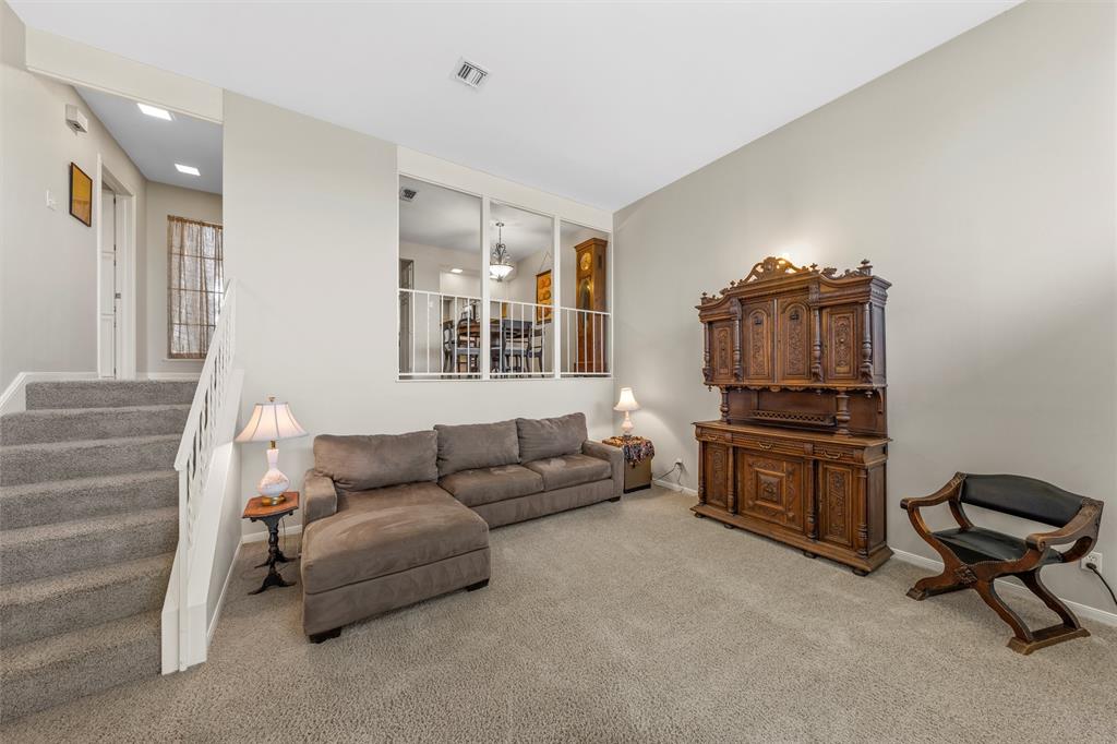 2901 Lake Shore Drive, Unit 405 Waco, TX 76708 - Photo 6 of 31 a living room with furniture and a window