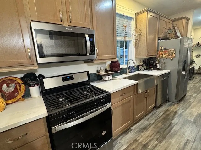 a kitchen with a stove and a microwave