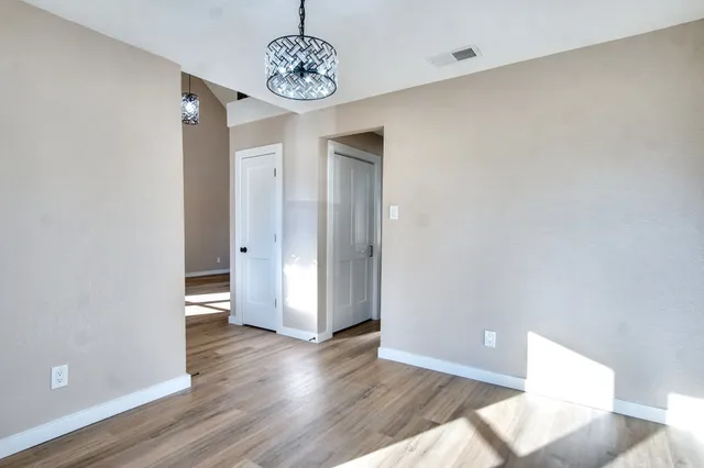 a workspace with furniture and wooden floor