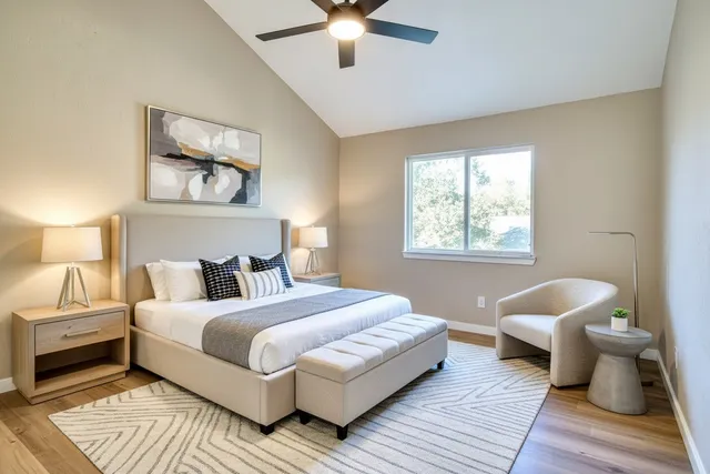 a view of a bathroom with a tub and shower