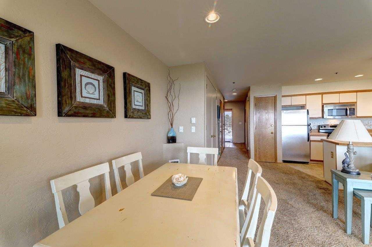 561 South Promenade Seaside, OR 97138 - Photo 5 of 35 Beach Club condo dining to kitchen to be