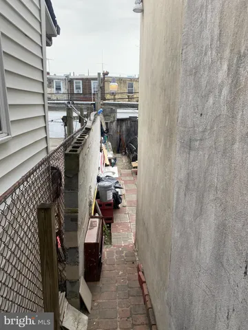 a bathroom with a shower and a sink