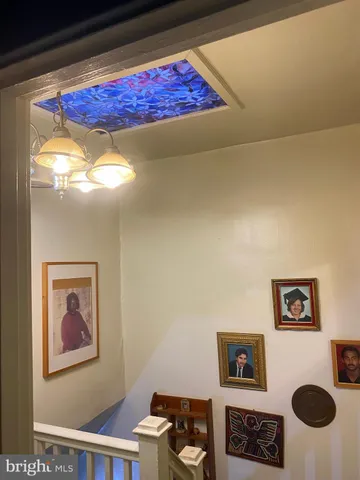 a view of workspace with furniture and a window