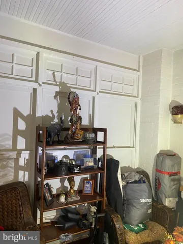 a living room with lots of furniture and appliances