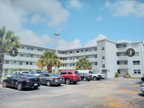 a car parked in front of a building
