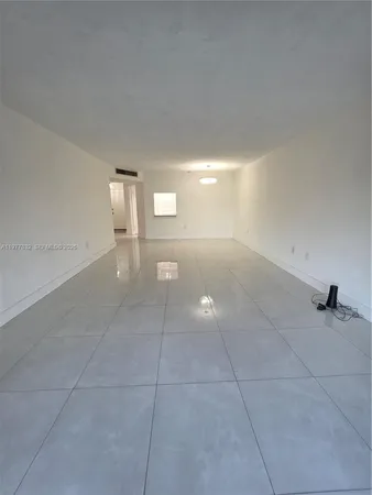 a view of a livingroom and a fireplace