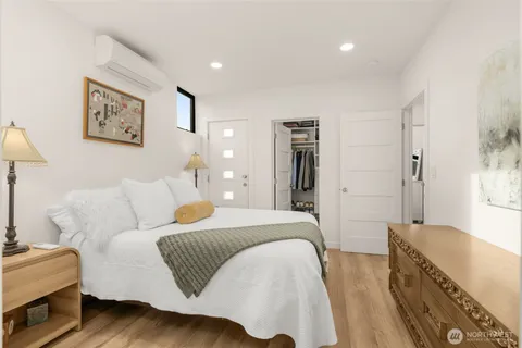 a bed room with a bed and a couch