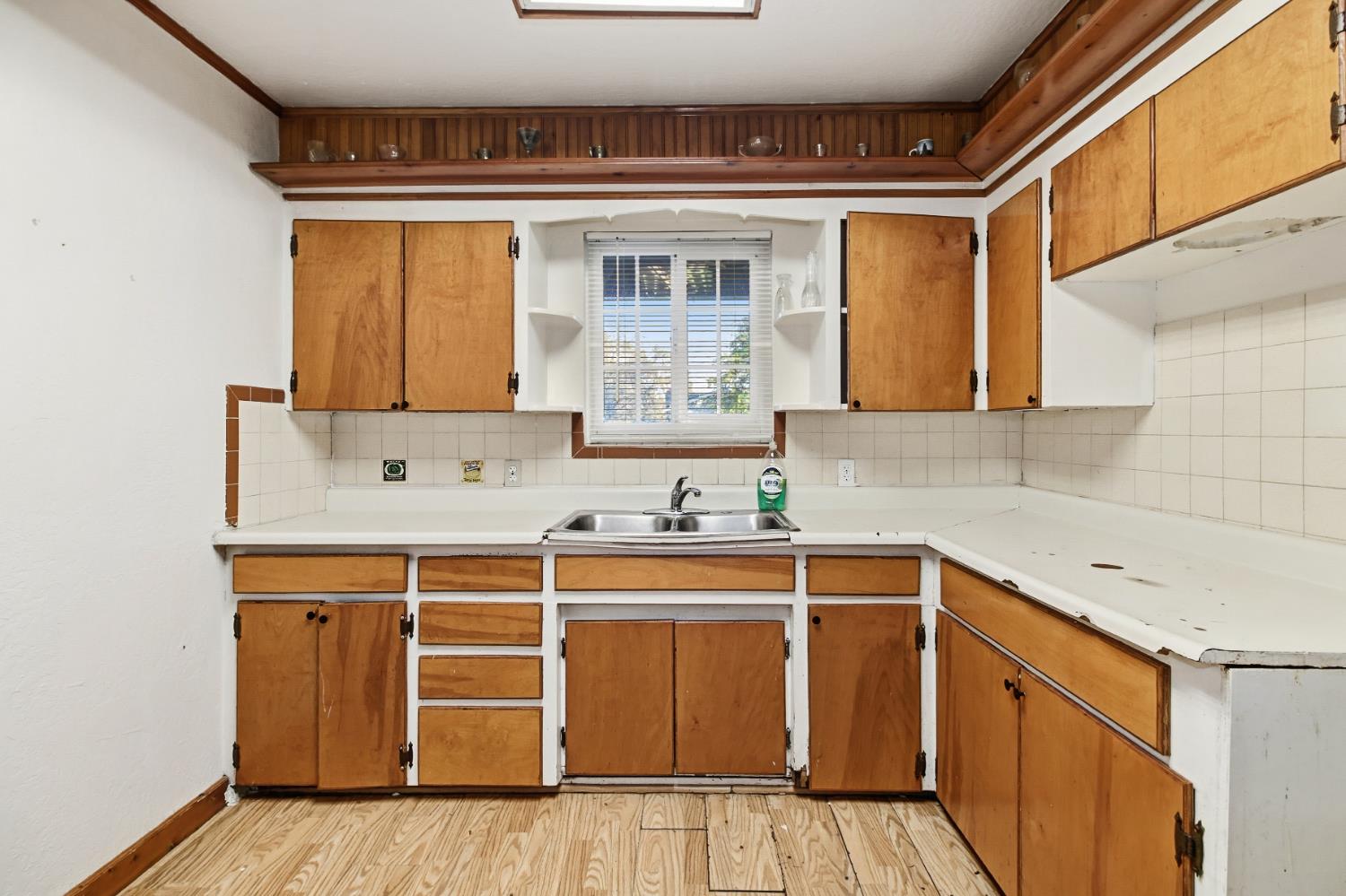 7334 Doc Adams Road Marysville, CA 95901 - Photo 11 of 30 a kitchen with stainless steel appliances a sink and cabinets