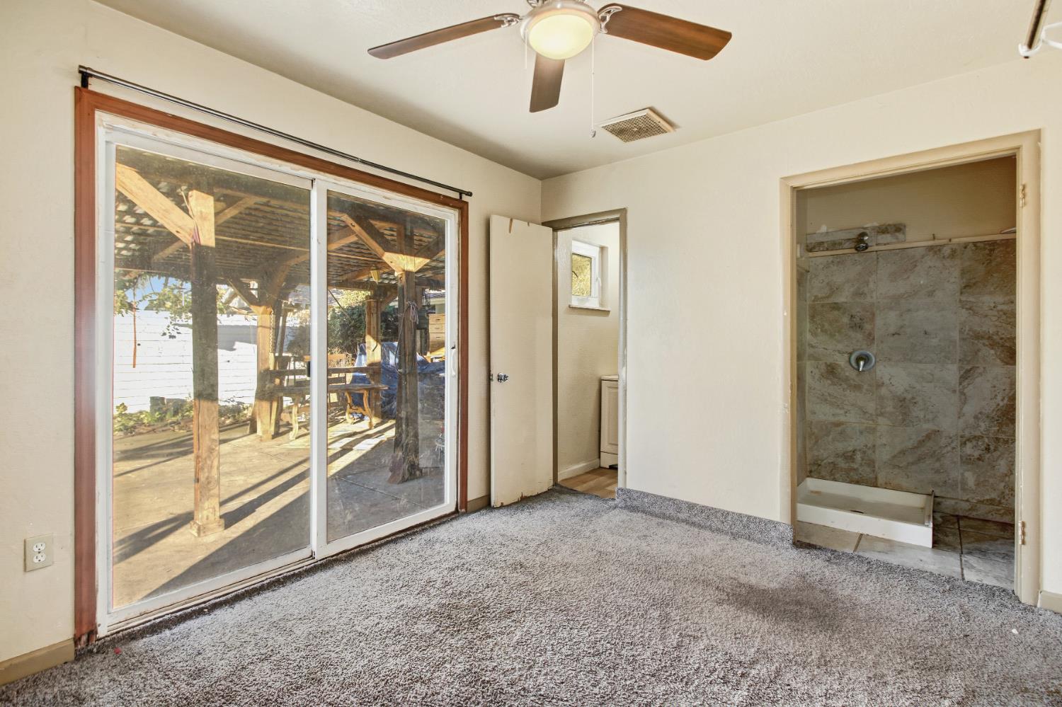 7334 Doc Adams Road Marysville, CA 95901 - Photo 16 of 30 a view of an empty room and window