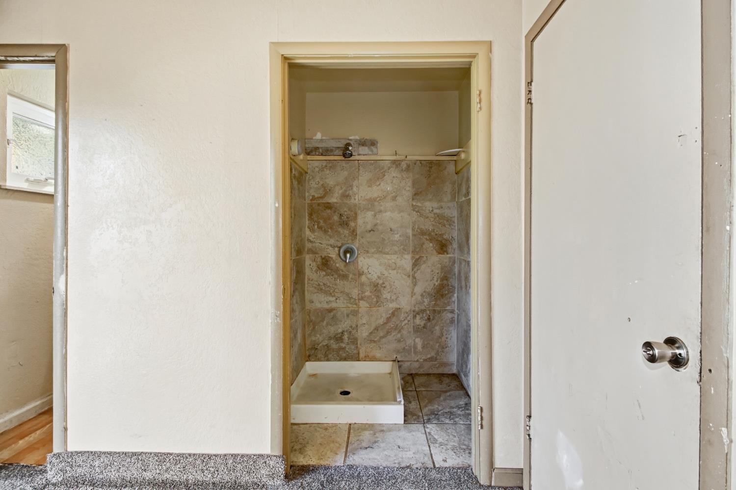 7334 Doc Adams Road Marysville, CA 95901 - Photo 18 of 30 a bathroom with a shower