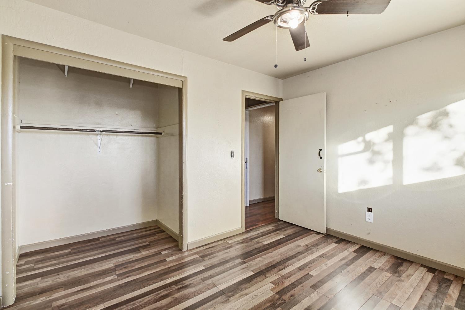 7334 Doc Adams Road Marysville, CA 95901 - Photo 26 of 30 a view of a livingroom with wooden floor and white walls
