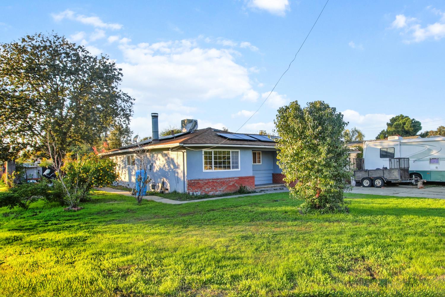 7334 Doc Adams Road Marysville, CA 95901 - Photo 29 of 30 a view of a house with a yard