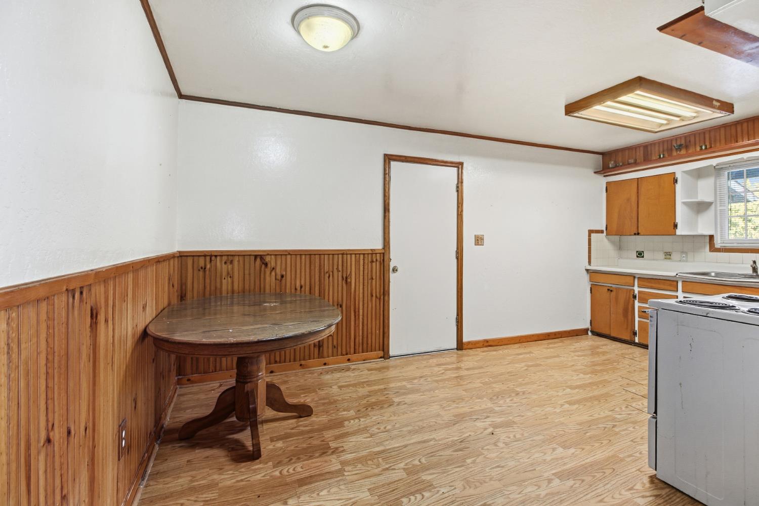 7334 Doc Adams Road Marysville, CA 95901 - Photo 8 of 30 a bathroom with a sink a toilet and a mirror