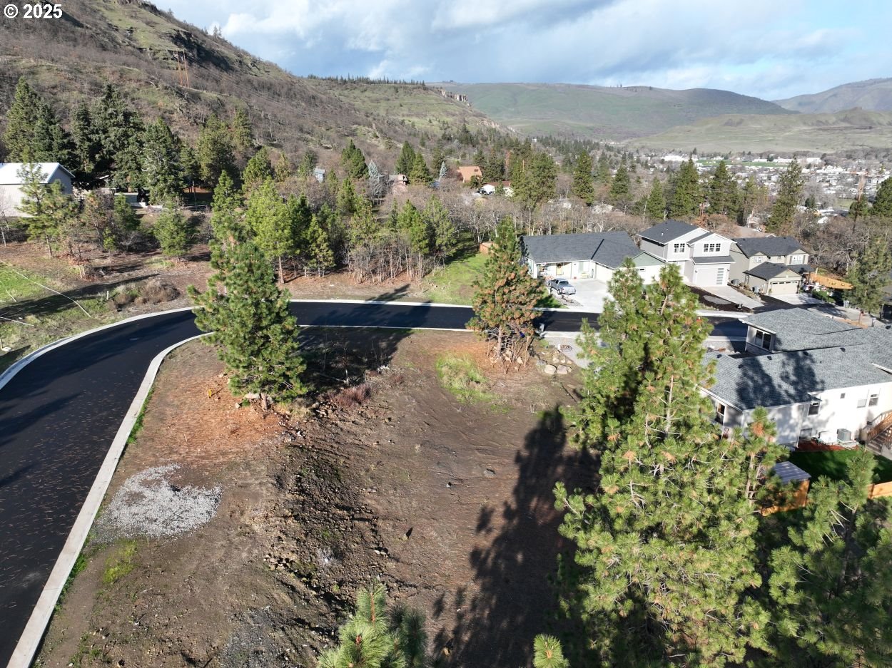 West 15th Street, Unit 36 The Dalles, OR 97058 - Photo 9 of 23 an aerial view of a house with a yard