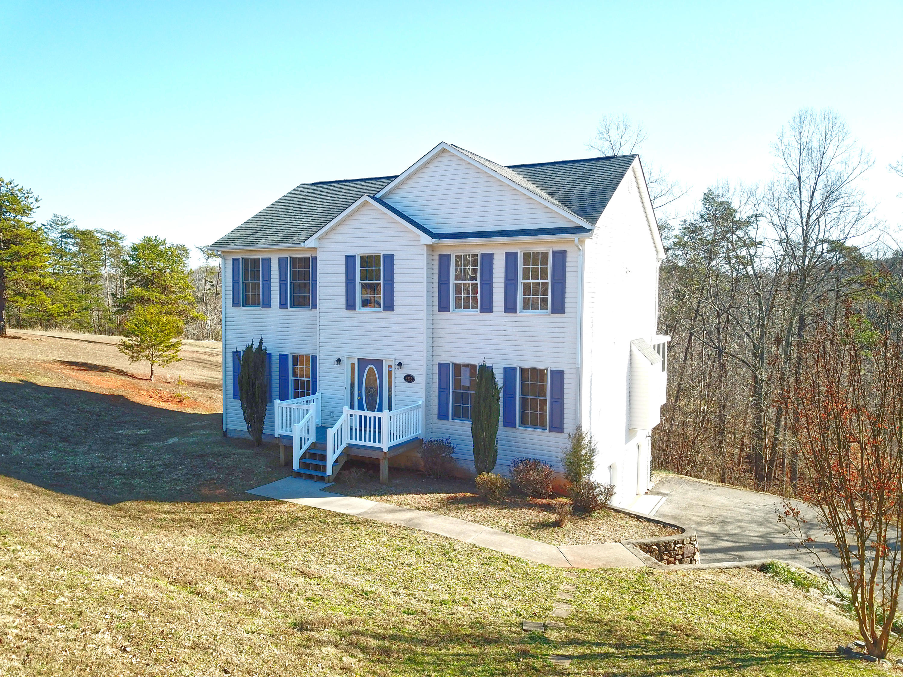 2232 Navigation Point Goodview, VA 24095 - Photo 3 of 27 a view of a house with a yard covered with snow in front of house