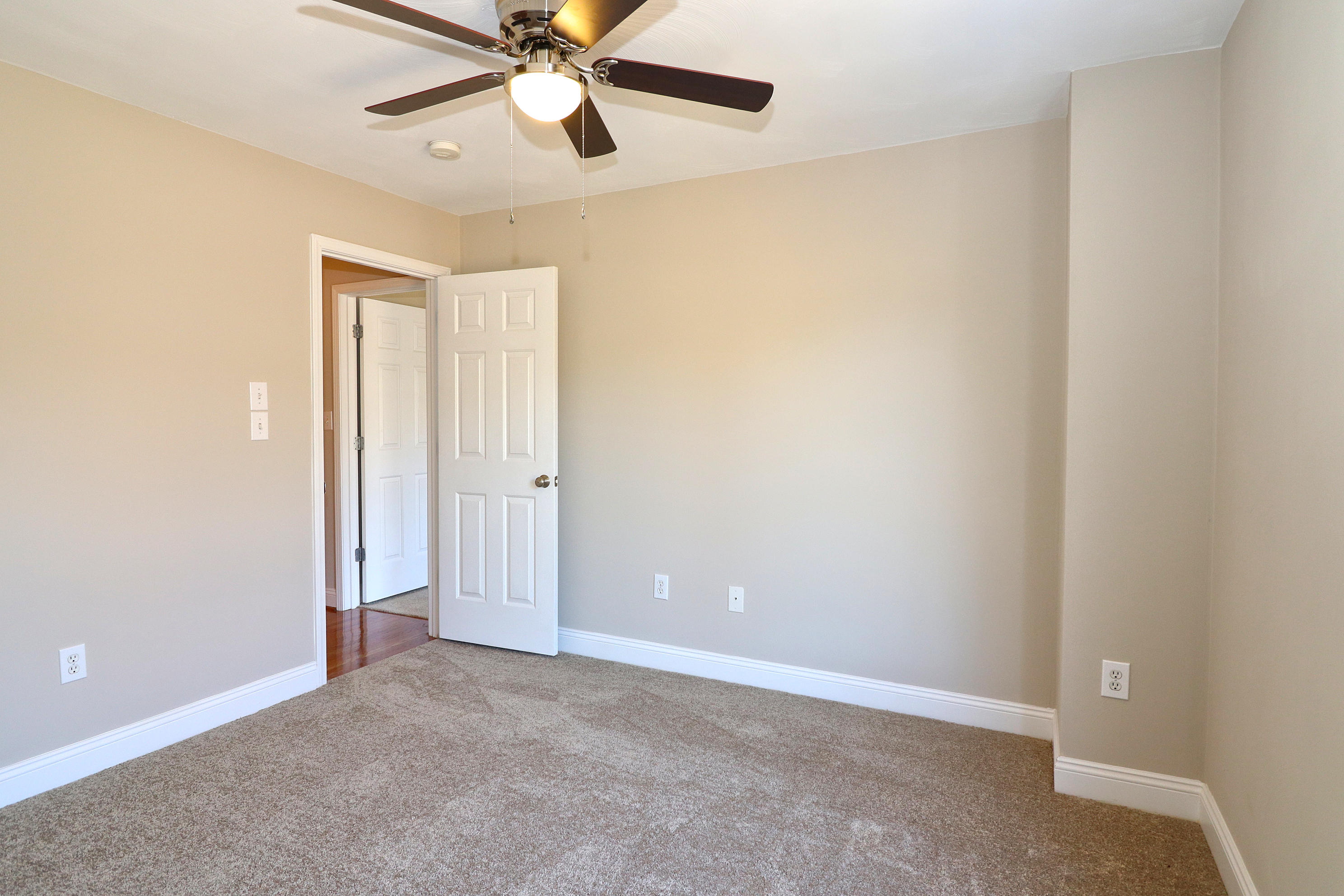 2232 Navigation Point Goodview, VA 24095 - Photo 22 of 27 an empty room with a ceiling fan and closet