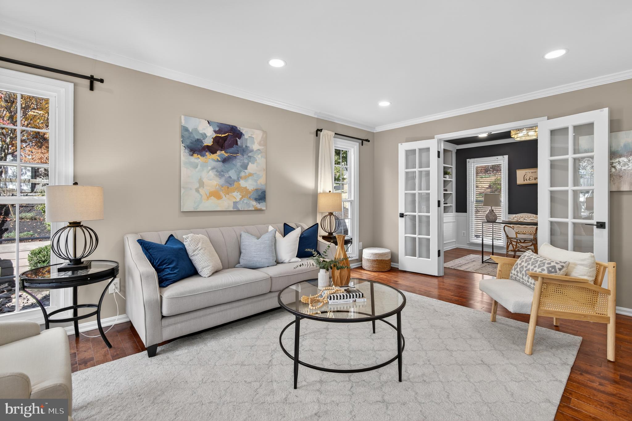 12100 Triple Crown Road North Potomac, MD 20878 - Photo 13 of 66 a living room with furniture and a large window