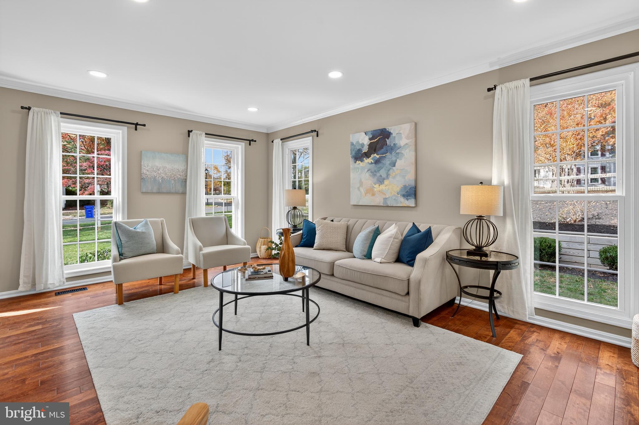 12100 Triple Crown Road North Potomac, MD 20878 - Photo 15 of 66 a living room with furniture and a large window