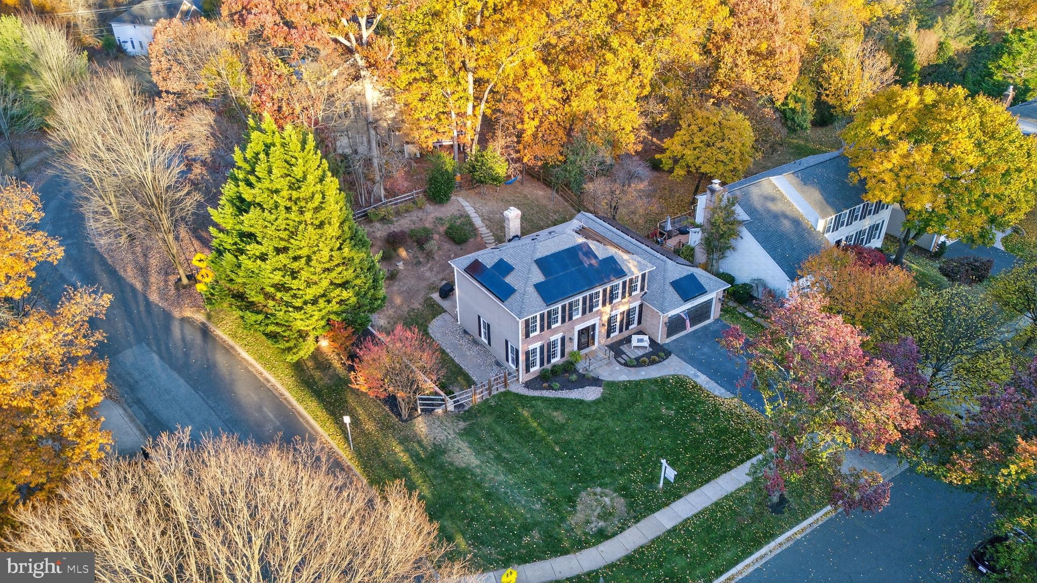 12100 Triple Crown Road North Potomac, MD 20878 - Photo 2 of 66 a view of a house with a yard