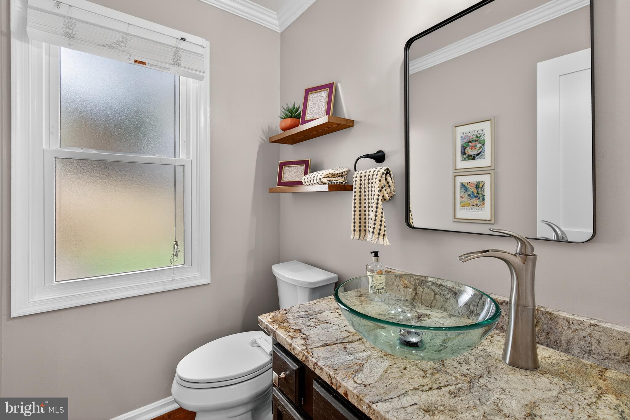 12100 Triple Crown Road North Potomac, MD 20878 - Photo 38 of 66 a bathroom with a granite countertop sink and a mirror