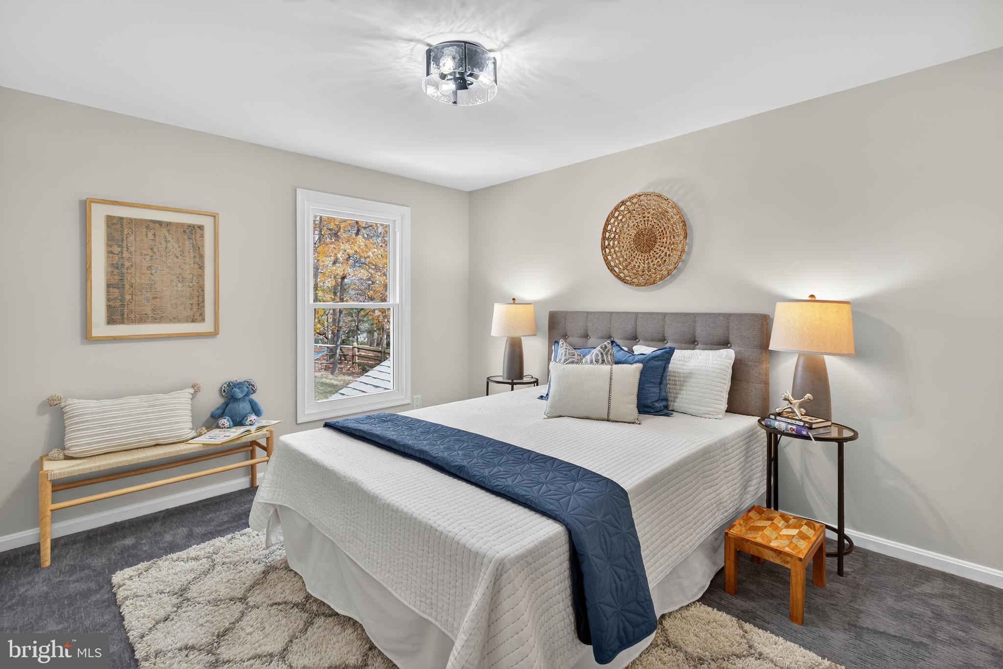 12100 Triple Crown Road North Potomac, MD 20878 - Photo 46 of 66 a bedroom with a bed and a chandelier