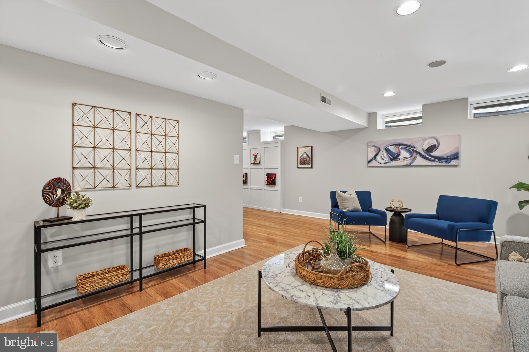 12100 Triple Crown Road North Potomac, MD 20878 - Photo 53 of 66 a living room with furniture and a potted plant