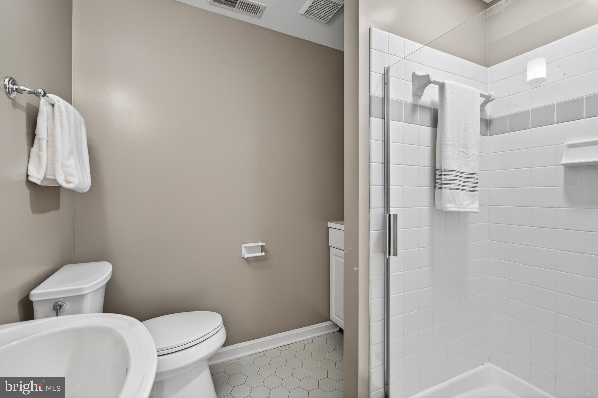 12100 Triple Crown Road North Potomac, MD 20878 - Photo 59 of 66 a bathroom with a toilet and a shower