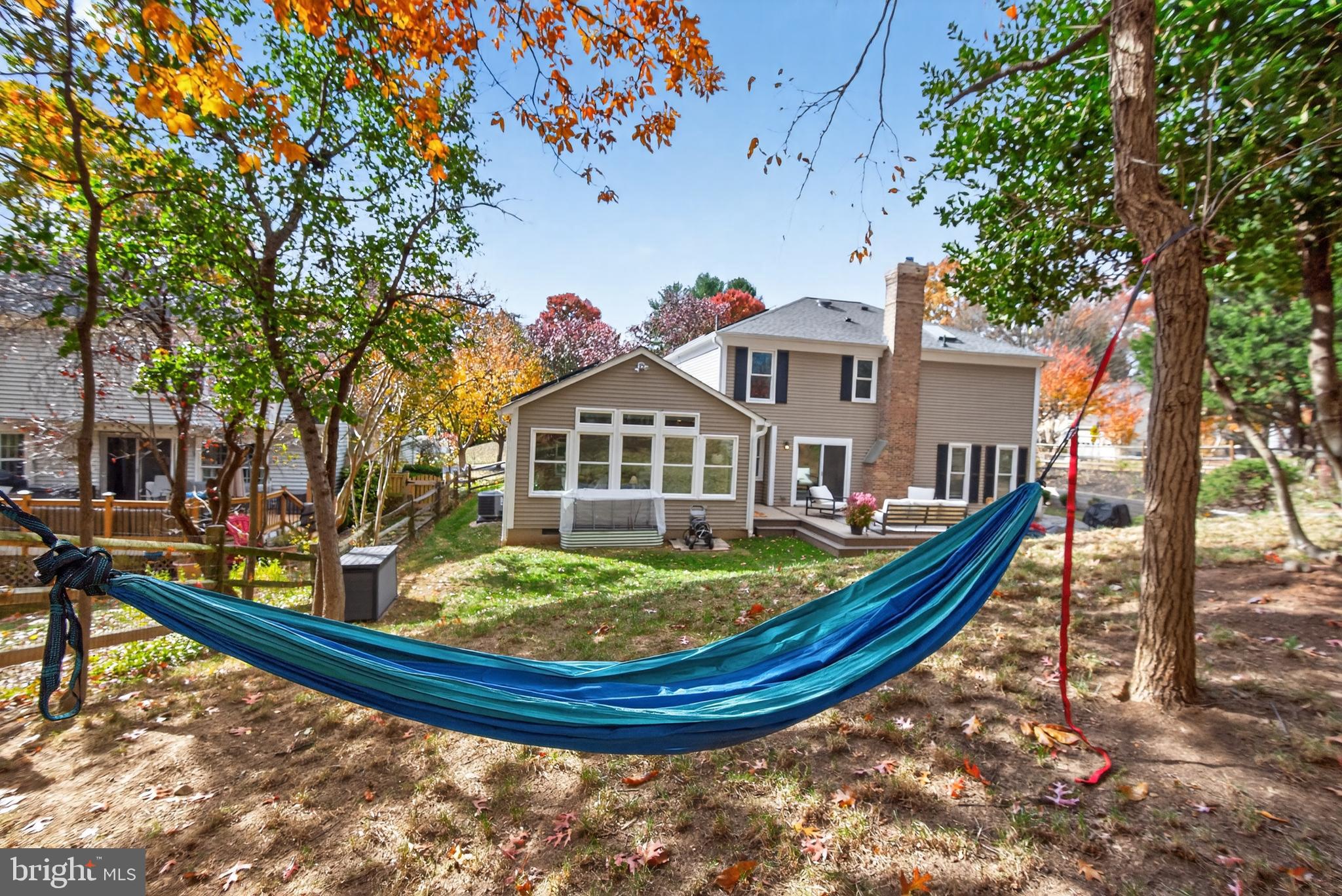 12100 Triple Crown Road North Potomac, MD 20878 - Photo 8 of 66 a view of a house with swimming pool